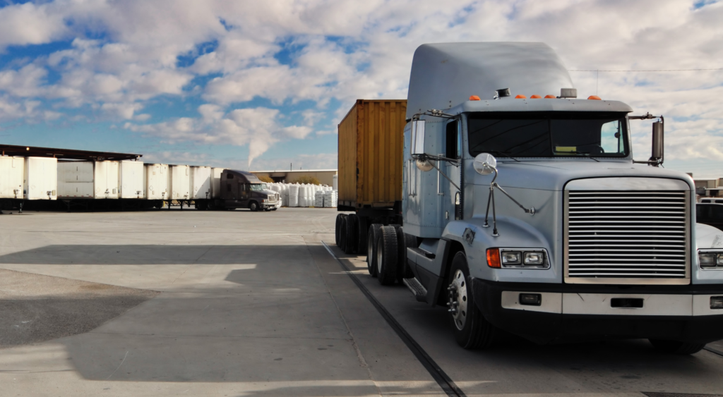 Heavy goods truck leaving loading bay